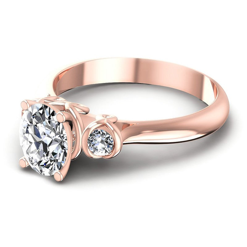 Round and Oval Diamonds 1.15CT Three Stone Ring in 18KT Rose Gold
